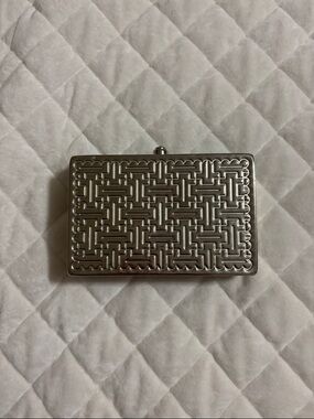 Silver Embossed Metal Clutch by Sasha